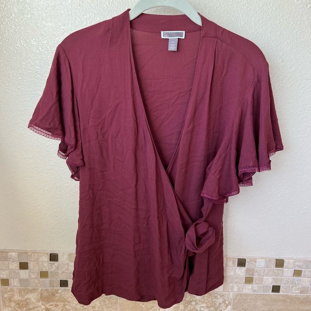 Chelsea 28 wrap top with flounce sleeves. Size M. Never worn